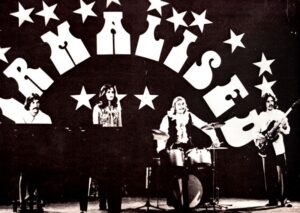 Toivo Kurmet, Melike Amjärv, Ülo Kurmet ja Paavo Soots Virmaliste vinüülplaadi kaanel. Album on välja antud 1980. aastal Stockholmis. 